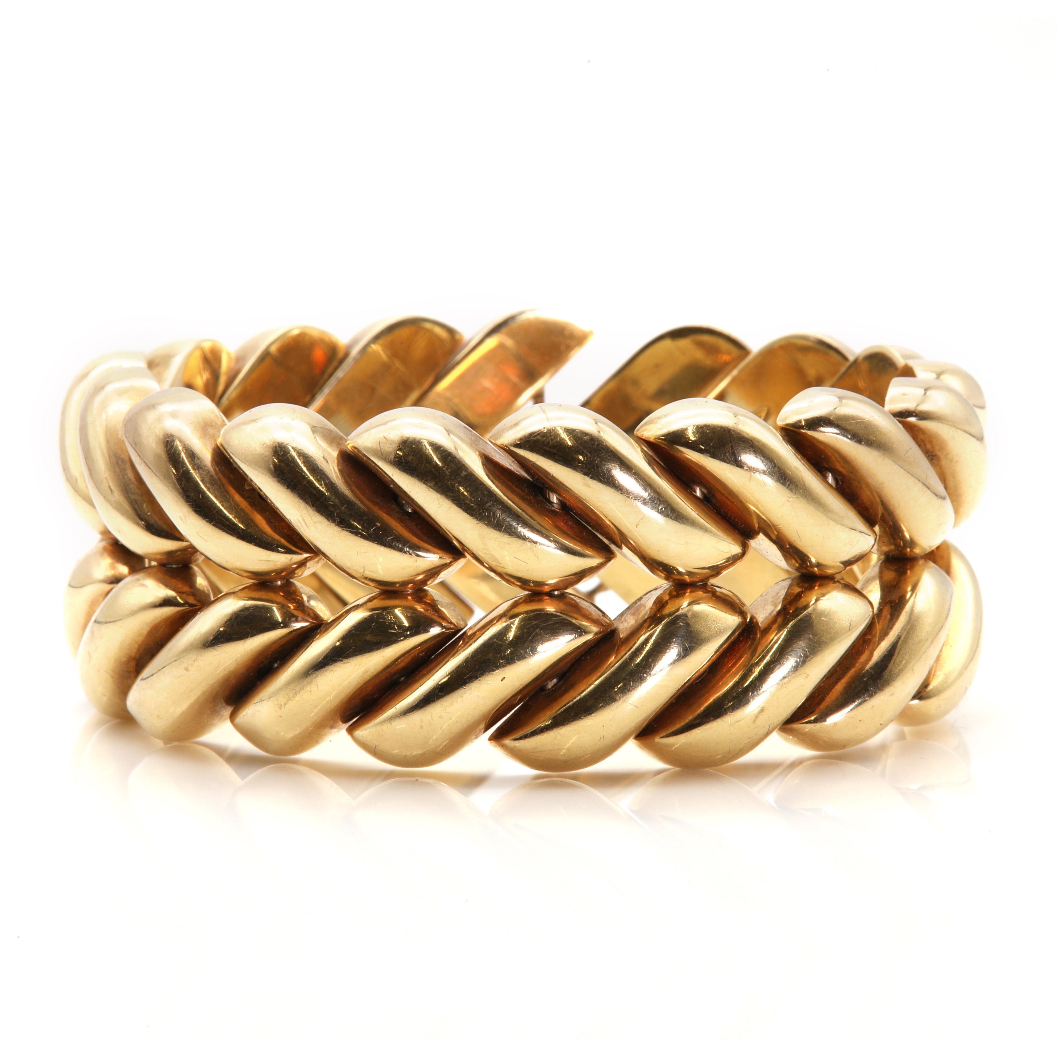 A 9ct gold plaited effect hollow bracelet, by Kutchinsky, c.1960